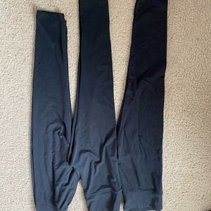 Three black leggings never worn